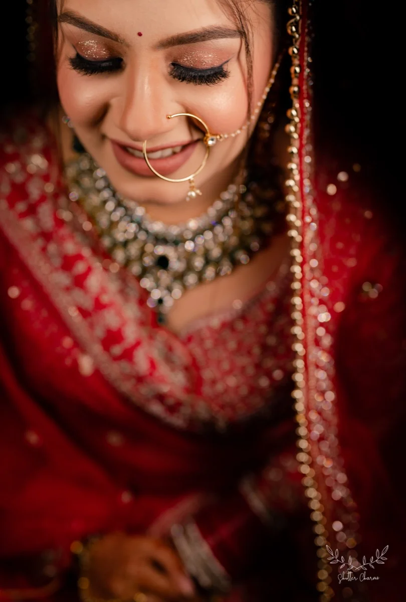 Bridal jewellery and red dupatta close-up