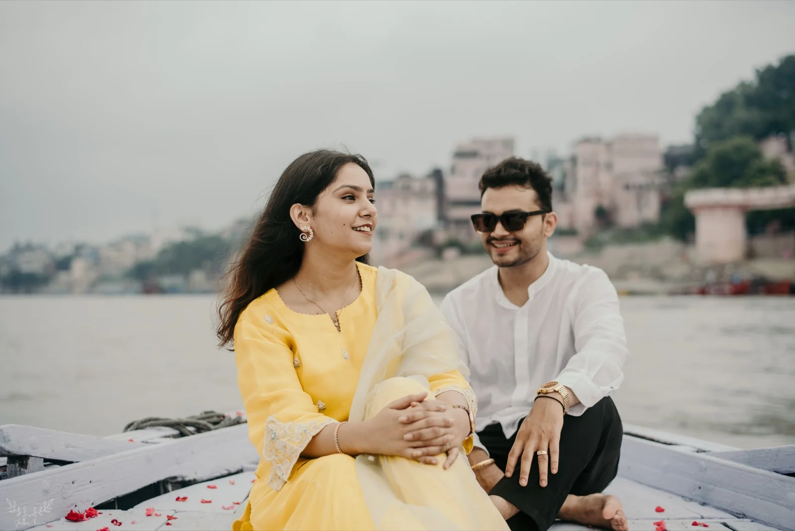 Couple enjoying a boat ride on the Ganges during pre-wedding shoot